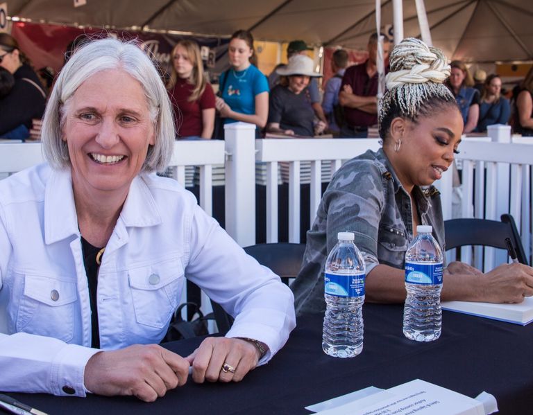 Sheri Brenden with Author Jemele Hill signing books at Tucson Festival of Books